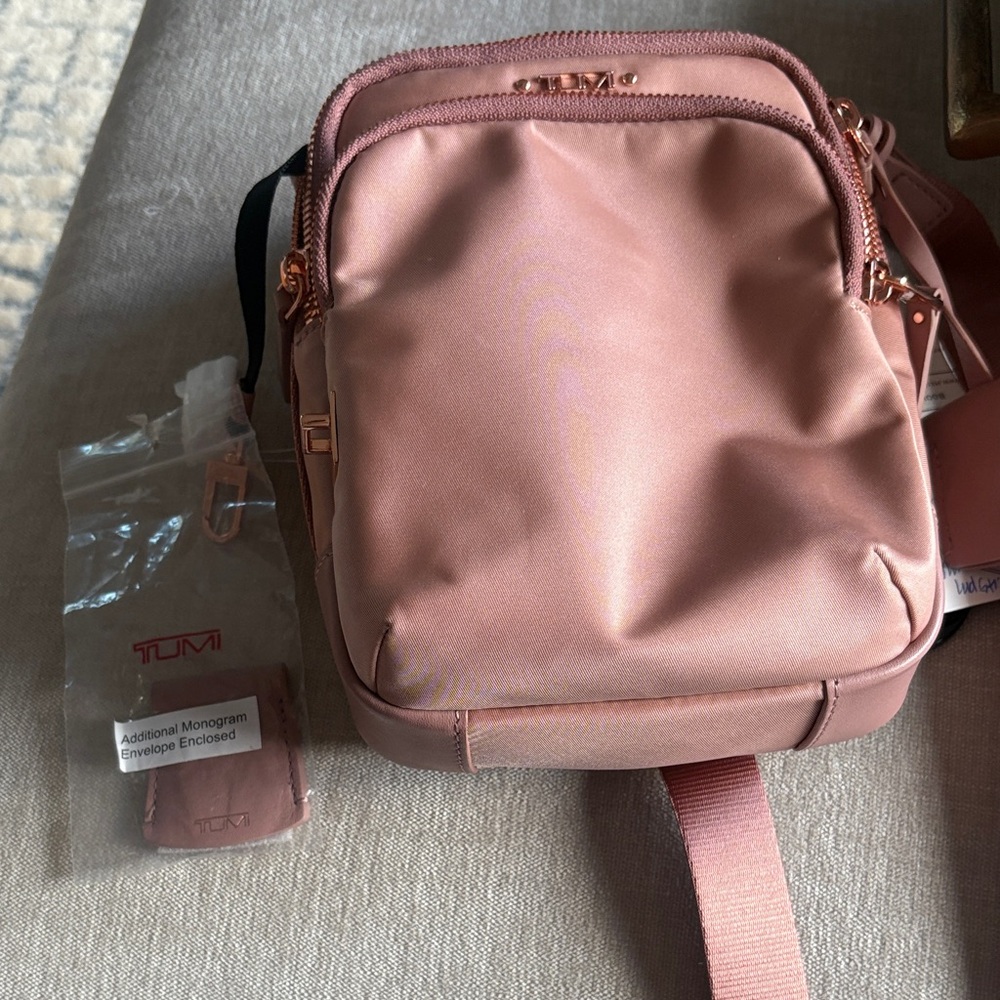 Tumi Crossbody Bag in rose gold Pink with rose gold hardware. - Picture 3 of 6